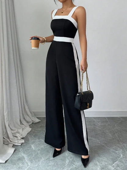 Side view of the Celina Studio elegant color-block wide-leg jumpsuit with a tailored fit and modern silhouette.