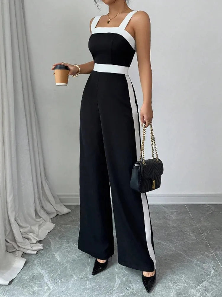 Front view of the Celina Studio Black & White sleeveless wide-leg jumpsuit featuring a flattering square neckline and high waist.