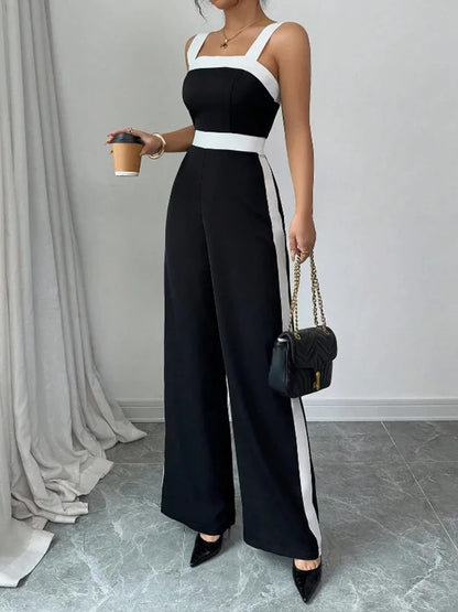 Front view of the Celina Studio Black & White sleeveless wide-leg jumpsuit featuring a flattering square neckline and high waist.
