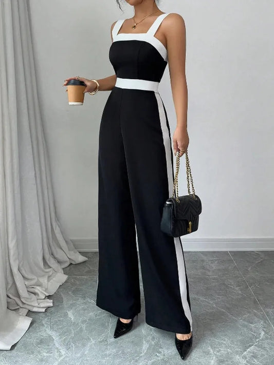 Front view of the Celina Studio Black & White sleeveless wide-leg jumpsuit featuring a flattering square neckline and high waist.