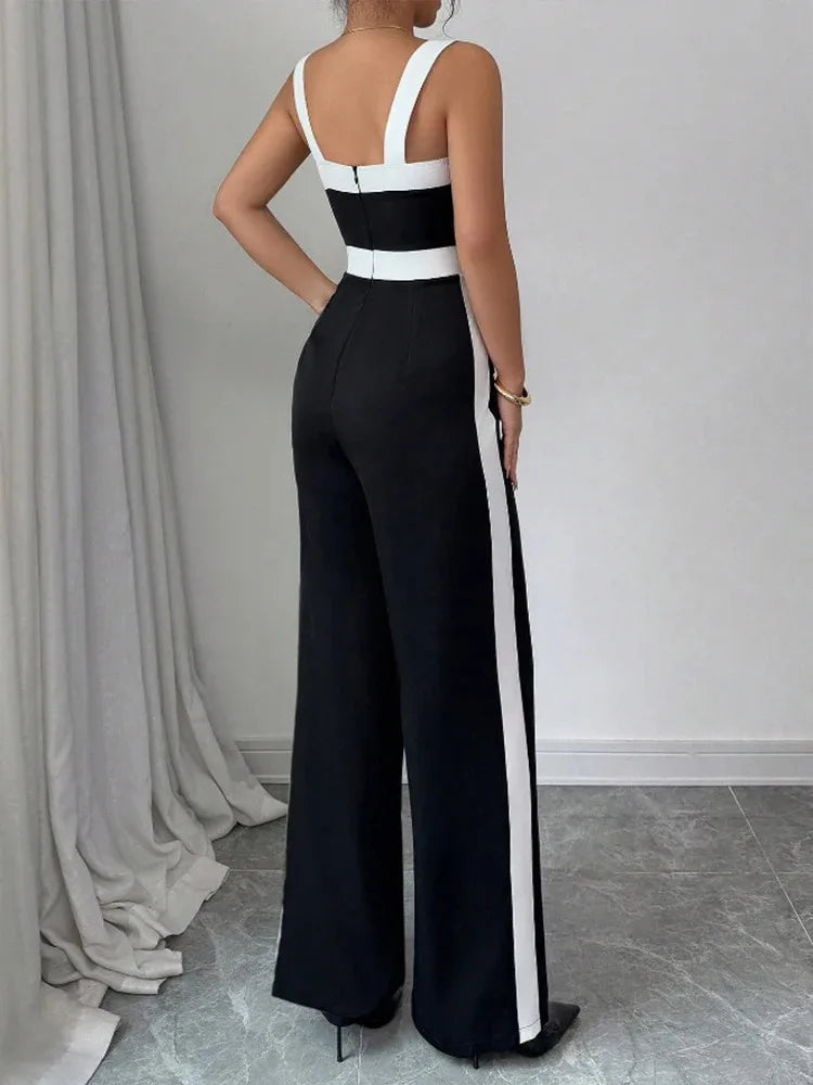 Back view of the Celina Studio sleeveless black and white jumpsuit with a clean, elegant finish.