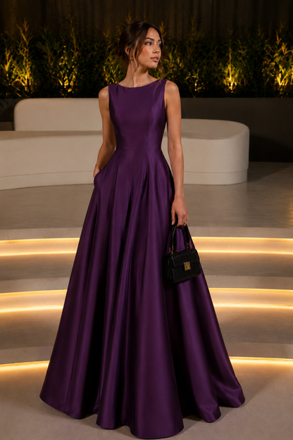 Woman wearing a purple sleeveless A-line maxi gown for formal occasions.