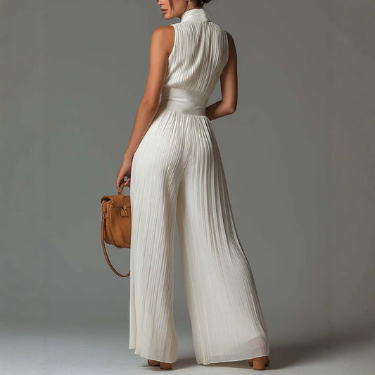 Elegant Pearl Ivory halter jumpsuit with flowing pleated wide-leg trousers.