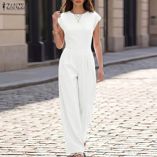Woman wearing the Celina Studio Ava Essential Wide-Leg Jumpsuit in Pearl Ivory.