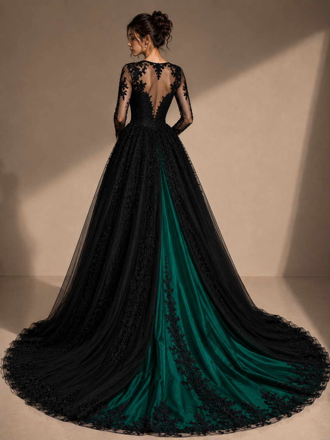 Back view of a black gothic lace ball gown with a dramatic green contrast train.