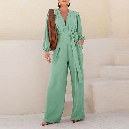 Woman wearing the Celina Studio Élan Wrap Wide-Leg Jumpsuit in Sage Mist with a relaxed wide-leg silhouette.