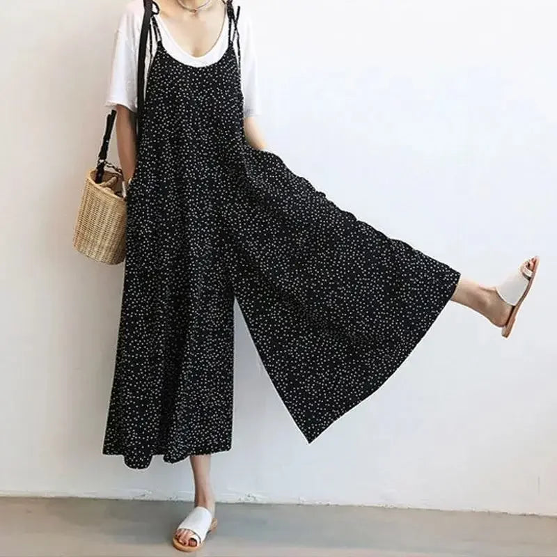 Relaxed-fit women's black wide-leg overall jumpsuit for everyday wear.