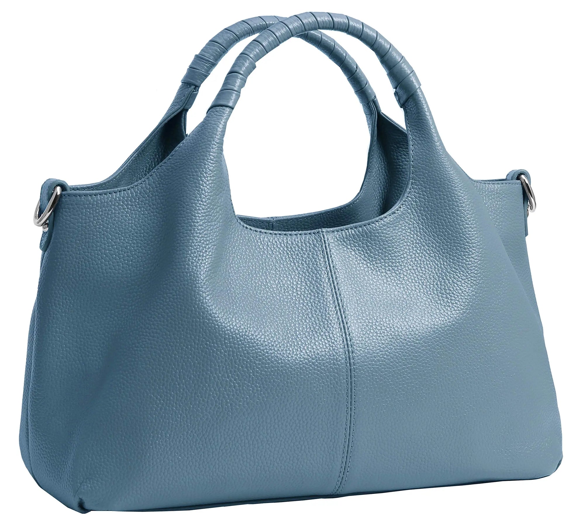 Woman carrying a sky blue soft leather shoulder tote bag.