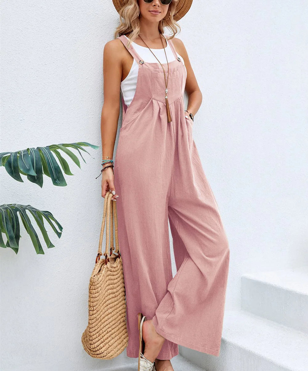 Woman wearing the Celina Studio Solstice Relaxed Wide-Leg Overall Jumpsuit in Blush Pink.