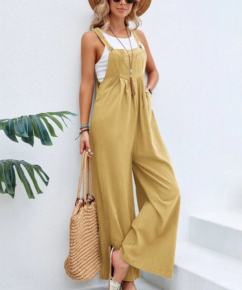 Woman wearing the Celina Studio Solstice Relaxed Wide-Leg Overall Jumpsuit in Golden Sand.