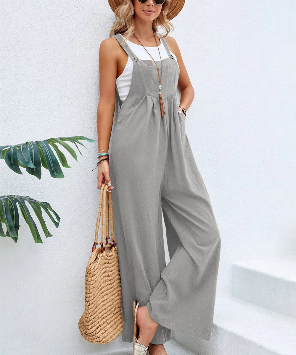 Woman wearing the Celina Studio Solstice Relaxed Wide-Leg Overall Jumpsuit in Slate Gray.