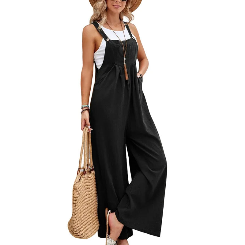 Woman wearing the Celina Studio Solstice Relaxed Wide-Leg Overall Jumpsuit in Midnight Black.