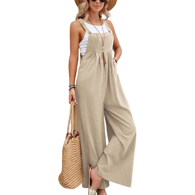 Woman wearing the Celina Studio Solstice Relaxed Wide-Leg Overall Jumpsuit in Sand Beige.