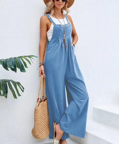 Woman wearing the Celina Studio Solstice Relaxed Wide-Leg Overall Jumpsuit in Sky Blue.
