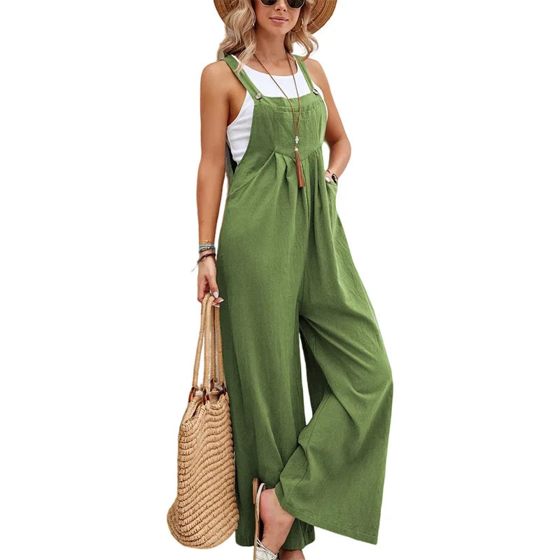 Woman wearing the Celina Studio Solstice Relaxed Wide-Leg Overall Jumpsuit in Sage Green.