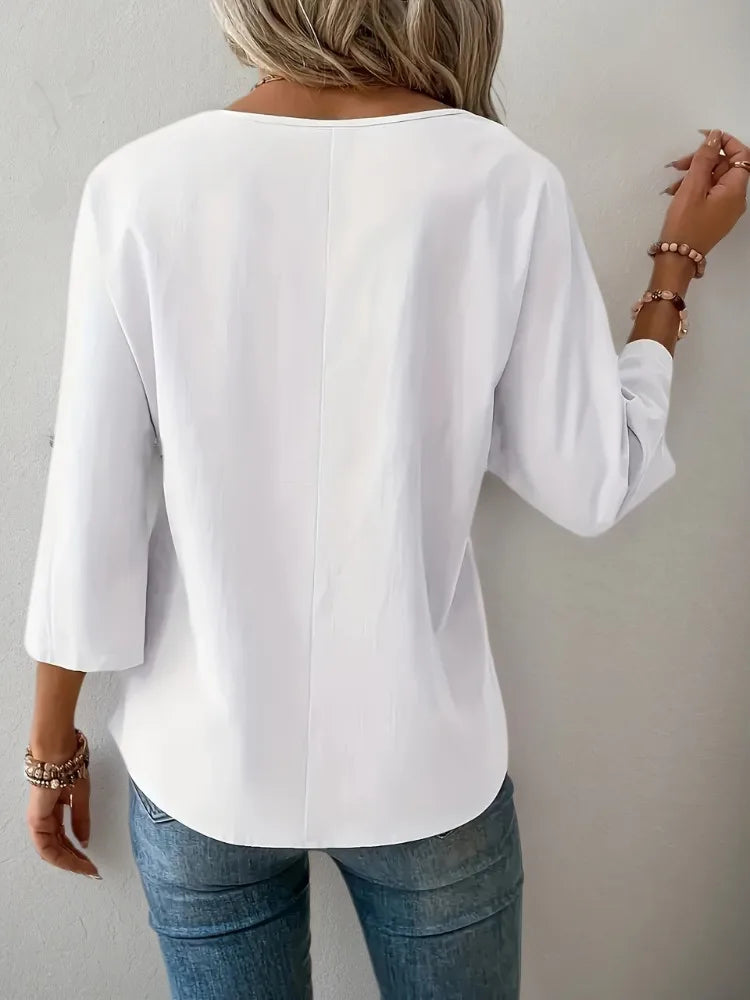 Back view of a white oversized casual linen blend blouse for women.